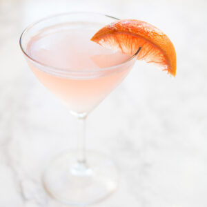 Hemingway cocktail garnished with a grapefruit wedge.