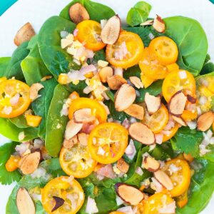 Kumquat salad with chopped almonds.