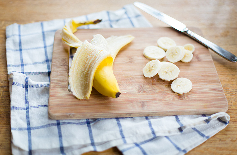 sliced banana on a cutting board