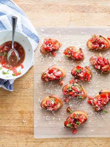 tomato bruschetta on a cutting board.