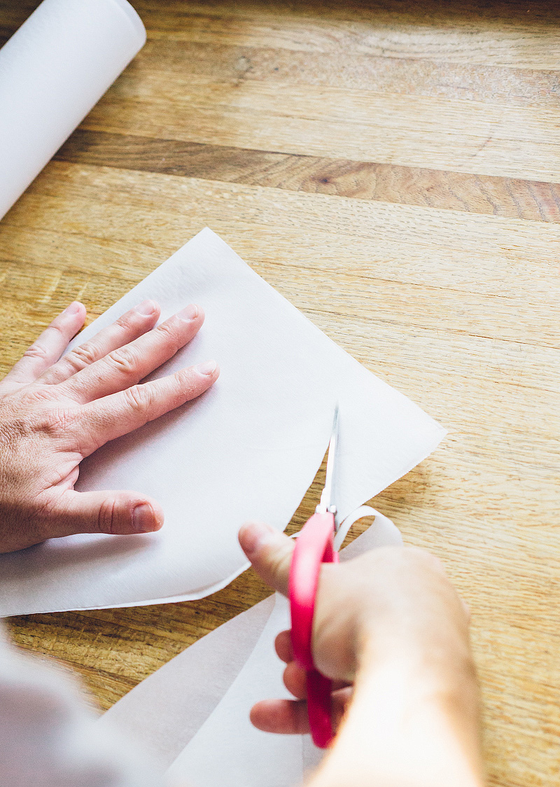 cutting a parchment heart