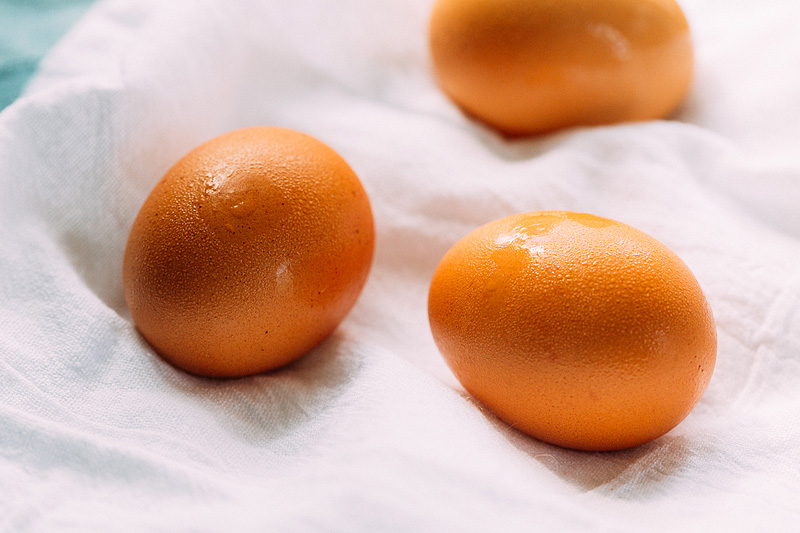 three brown eggs