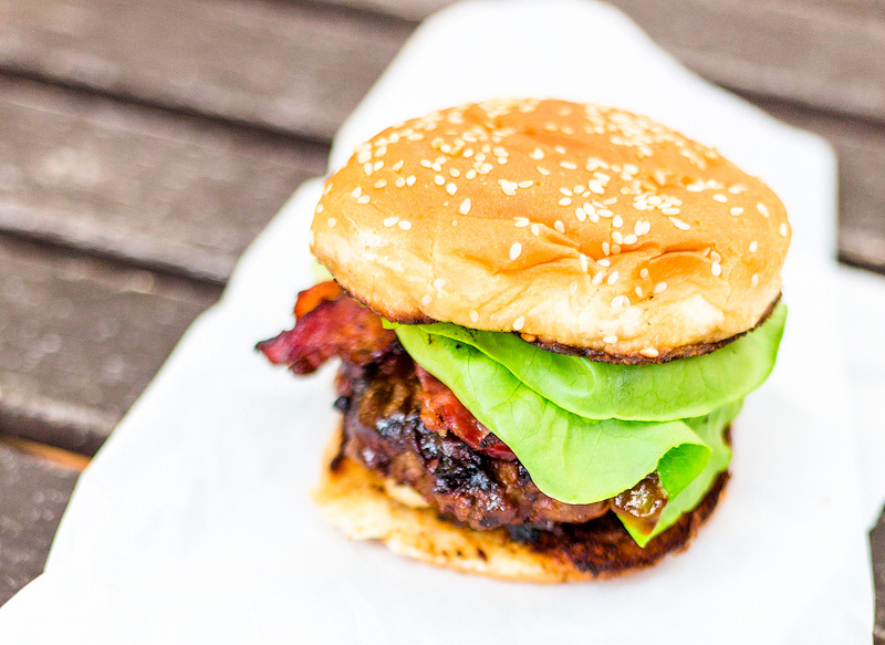 Hamburger with lettuce.