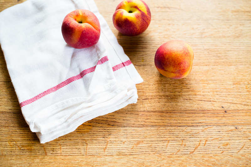 peaches and a dishcloth