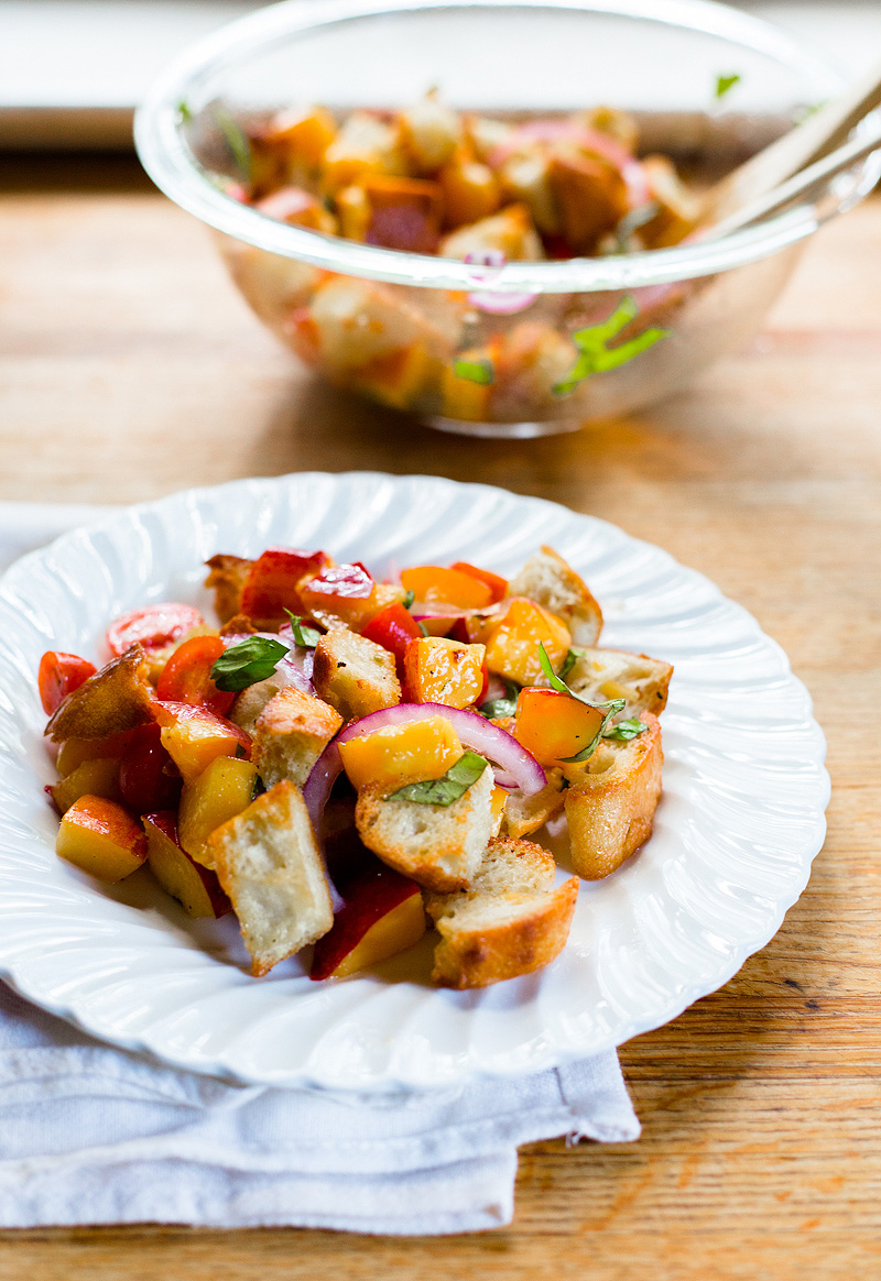 peach panzanella on a plate