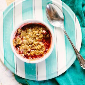 Strawberry crumble in a ramekin.