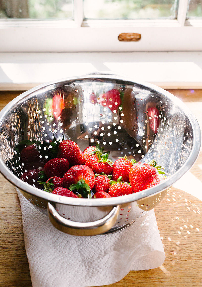 strawberries in a strainer