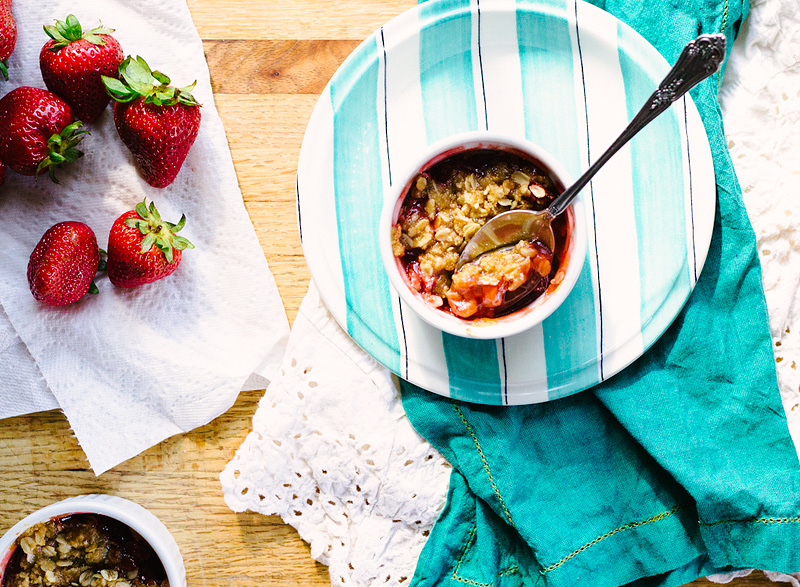 Eating a strawberry crumble.