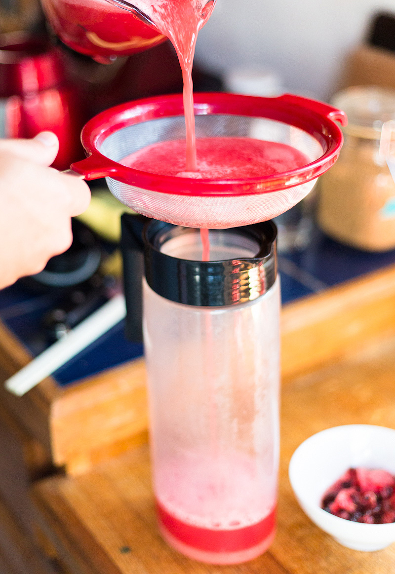 Straining watermelon.