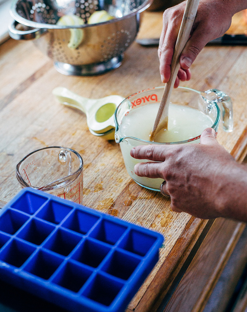 stirring lemon juice and water