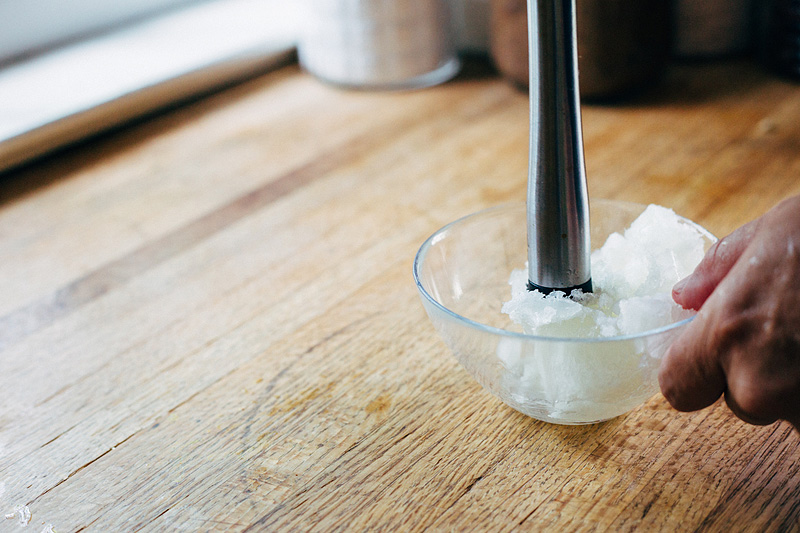 crushing lemon granita cubes