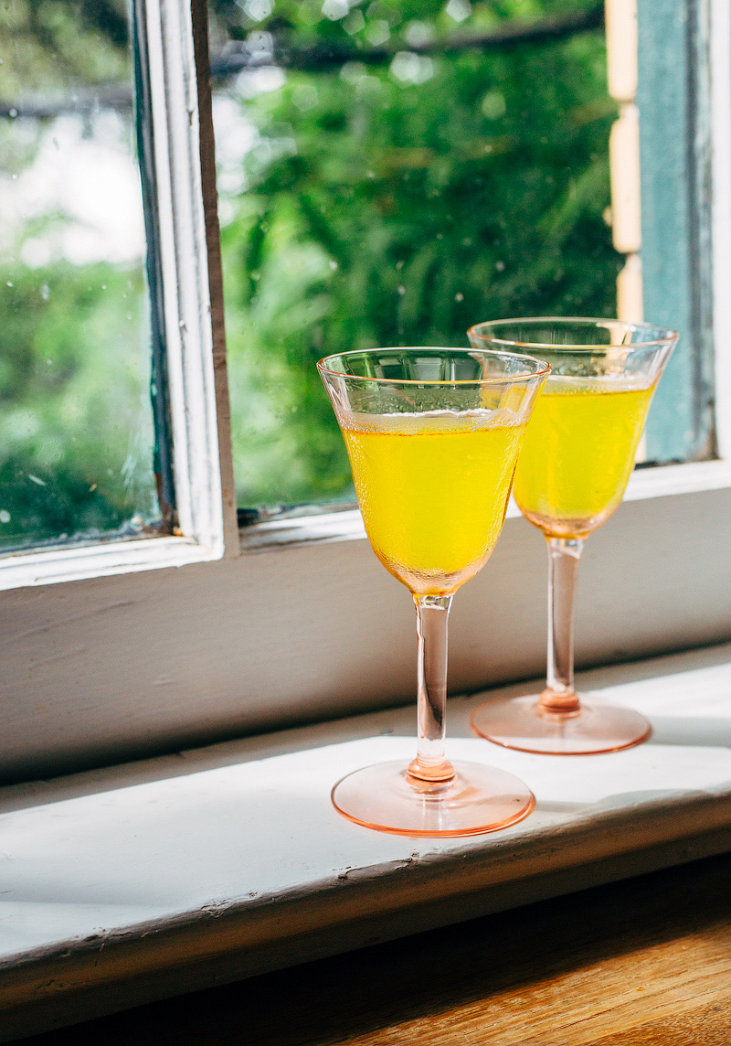 homemade limoncello on a windowsill