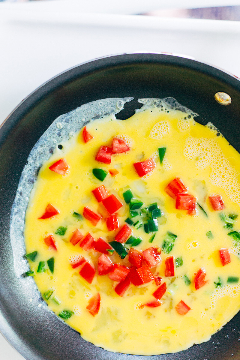 migas starting to cook in a pan