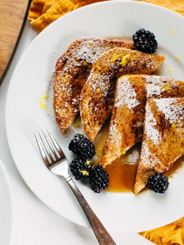 French toast with blackberries and lemon zest