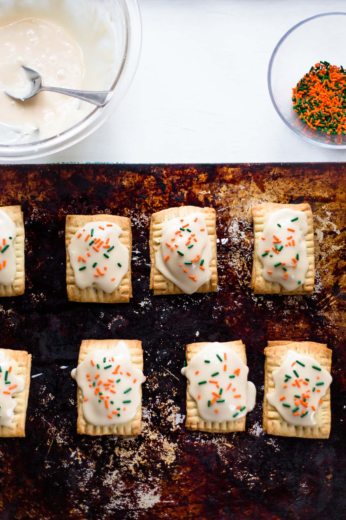 mini pumpkin pie pop tarts with sprinkles on top