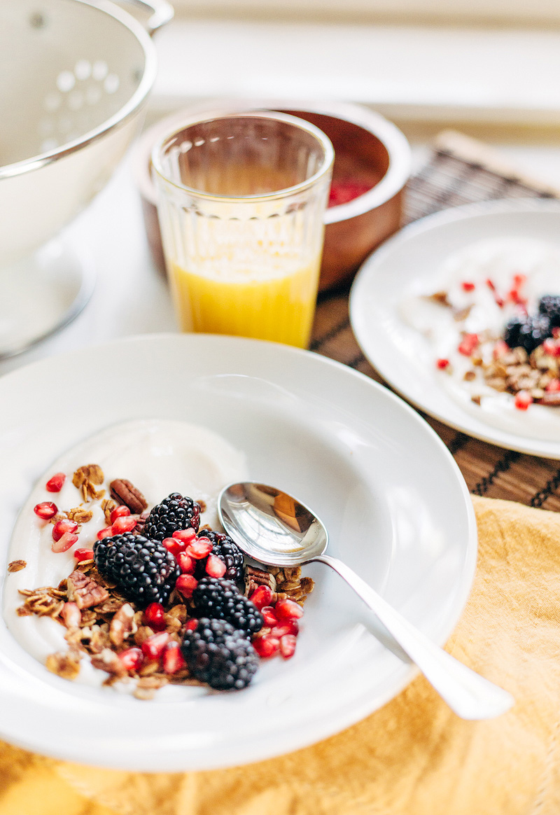 yogurt topped with blackberries and granola