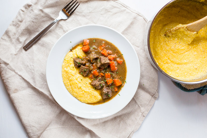 Beef Stew with Cheesy Polenta in a bowl