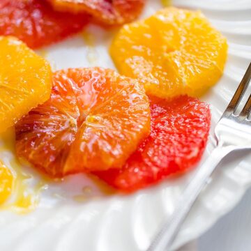 winter citrus salad drizzled with honey and olive oil