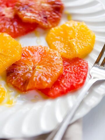 winter citrus salad drizzled with honey and olive oil
