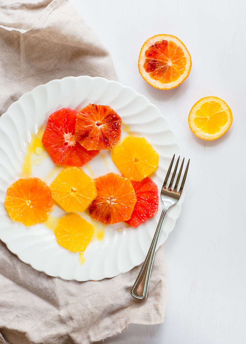 winter citrus salad on a plate with a fork