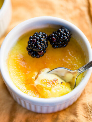 Vanilla bean creme brulee with blackberries