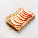 Peanut butter toast with apples and honey