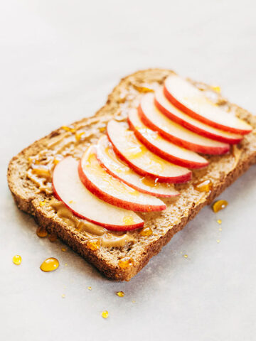 Peanut butter toast with apples and honey