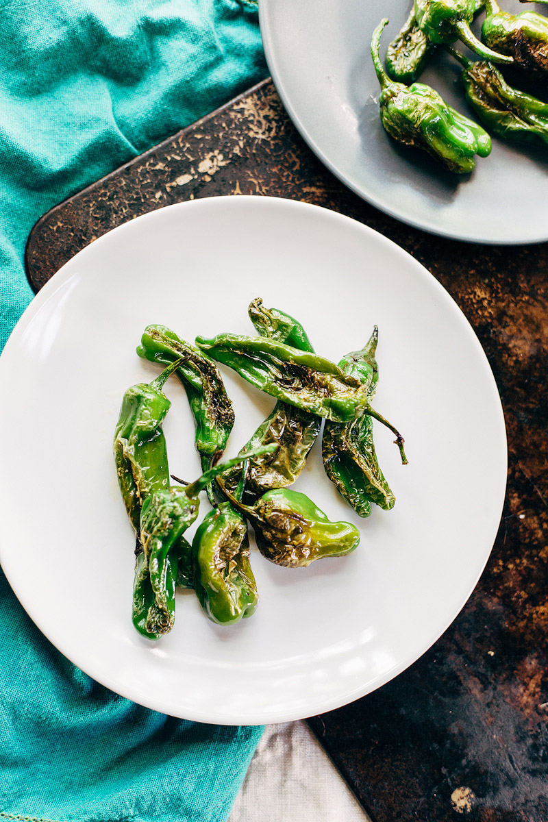 shishito peppers on a plate