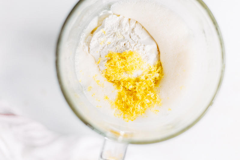 dutch baby pancake batter in a blender with lemon zest