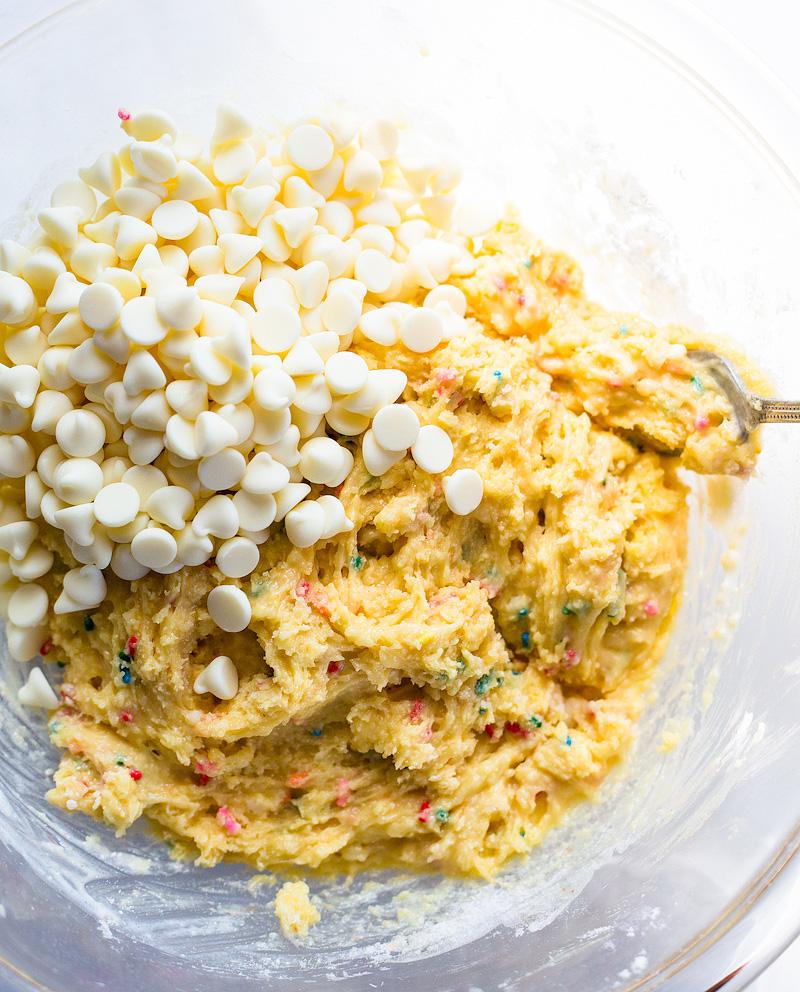 mixing white chocolate chips into the batter