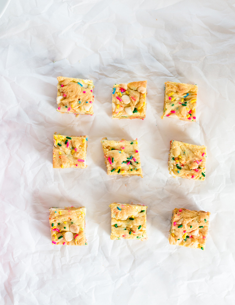 9 cookie cake bars on a sheet