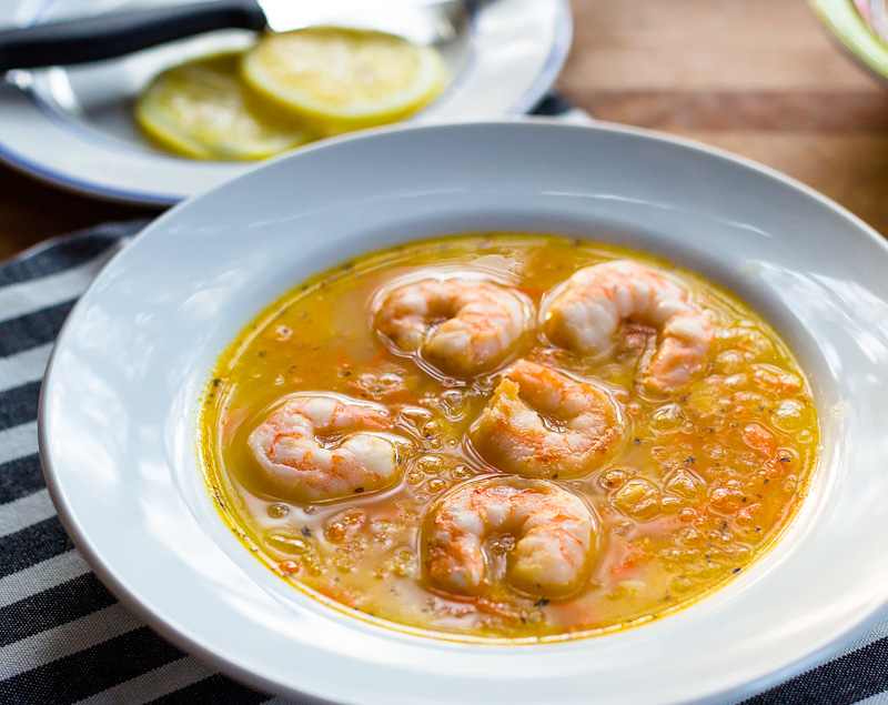 lemon orzo soup with shrimp in a bowl