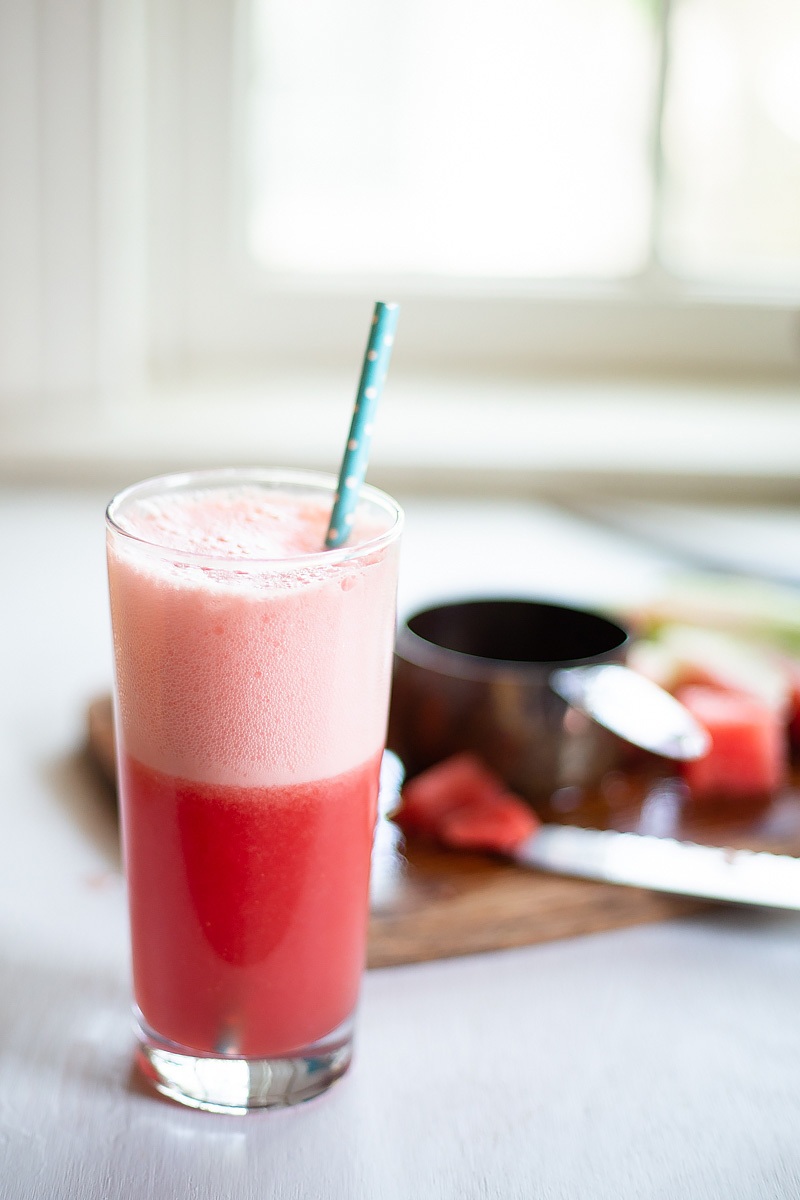 Watermelon Cucumber drink in a glass with a straw