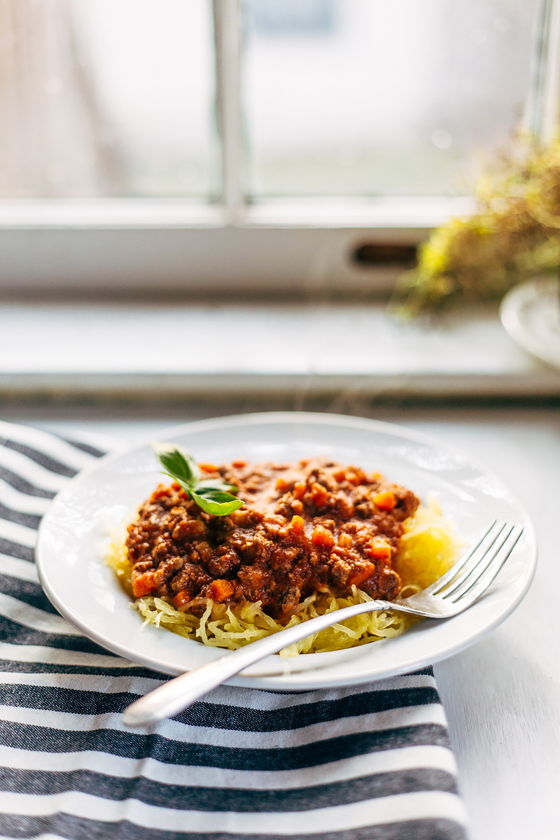 bolognese with spaghetti squash on a plate with a fork