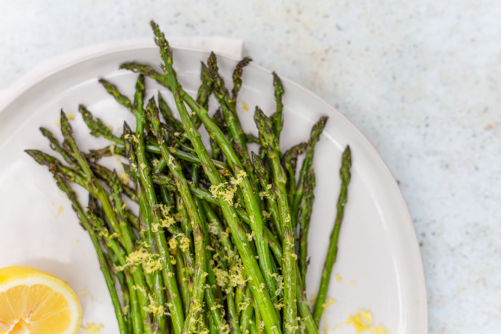 Roasted Asparagus with Lemon Zest on a plate