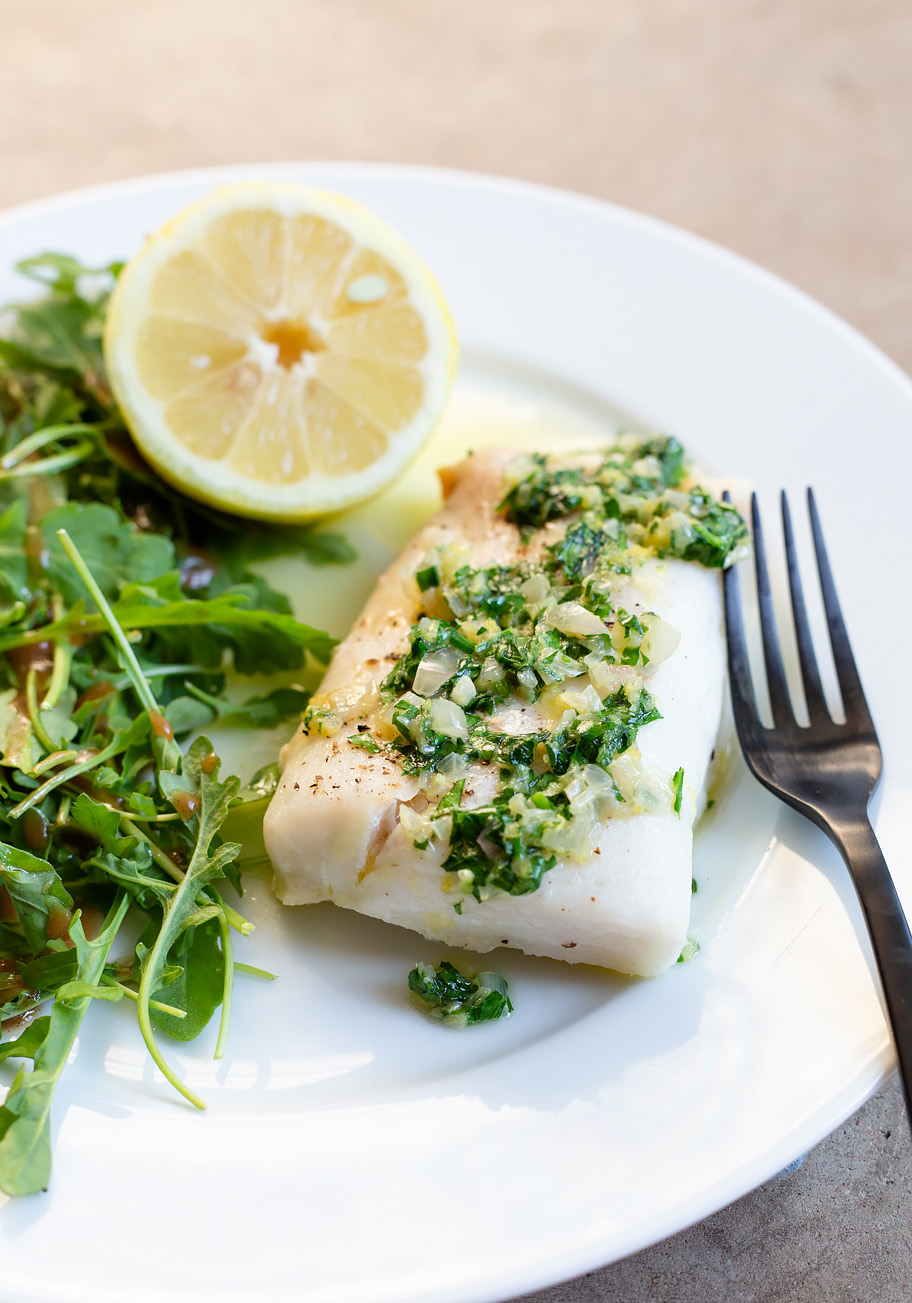 Cod with a Lemon Butter Shallot Sauce and a lemon half