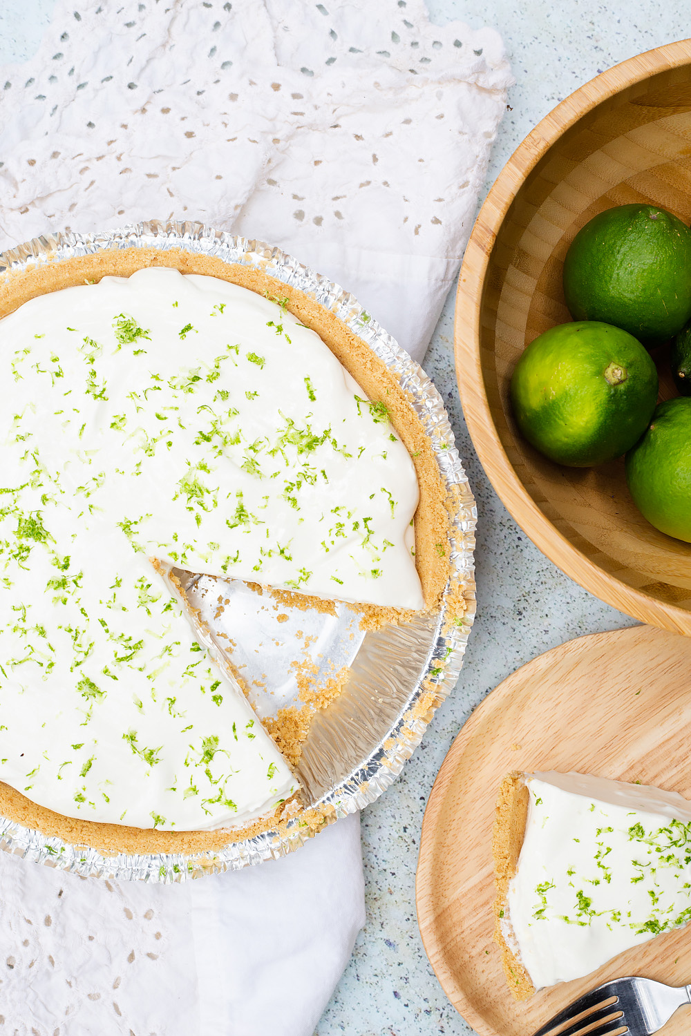 Limeade Pie from above with a bowl of limes on the side