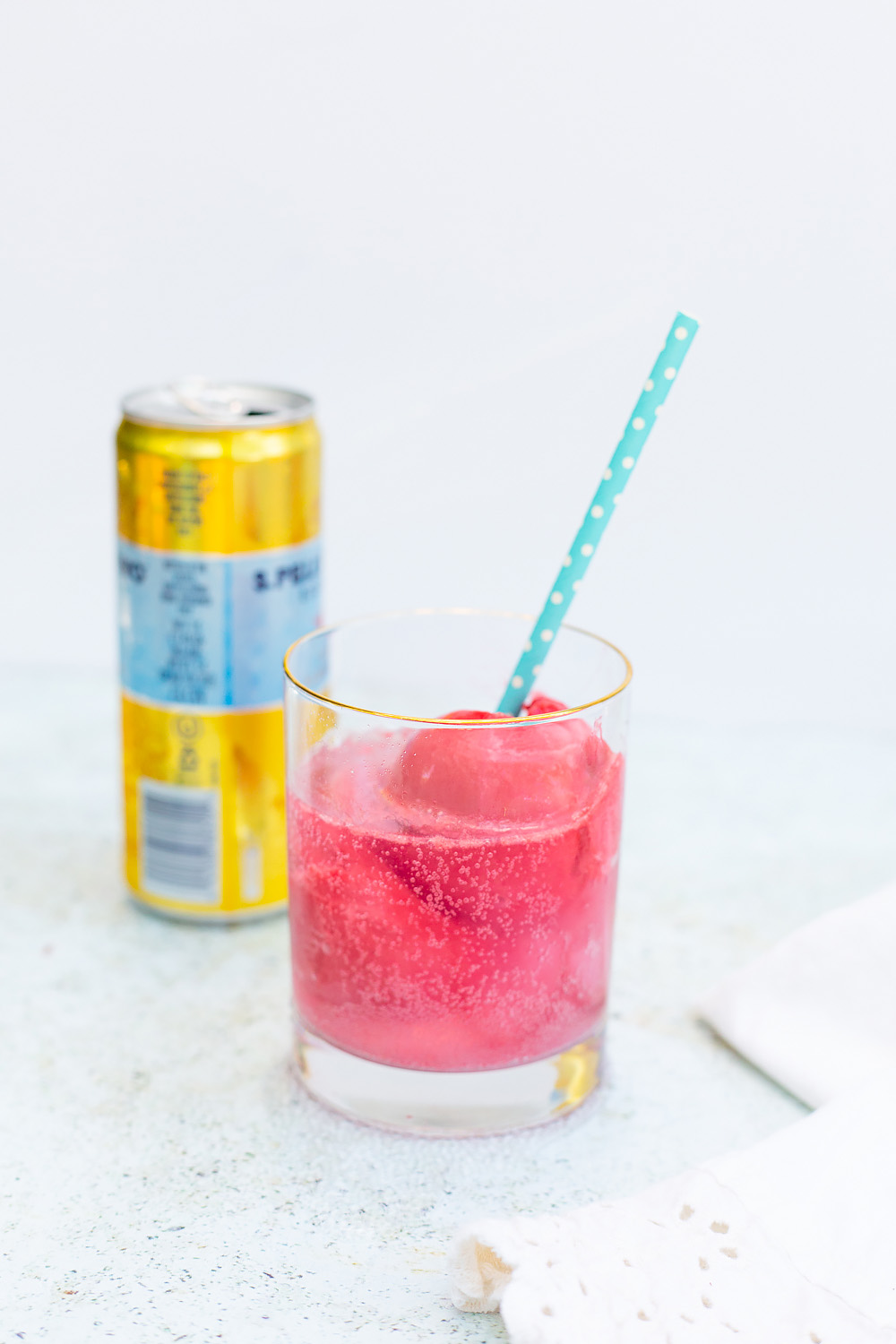 Raspberry Sorbet Mocktail with a straw