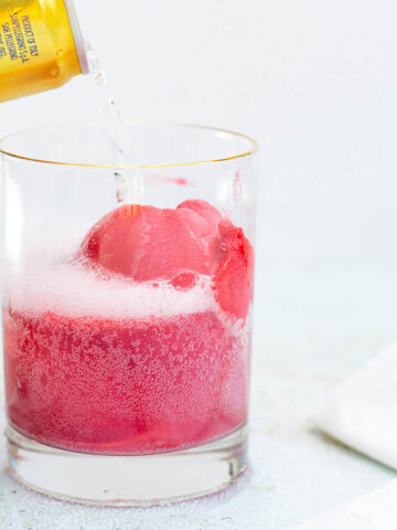 raspberry sorbet mocktail in a glass