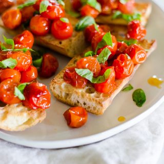 oven roasted tomatoes on toasted bread