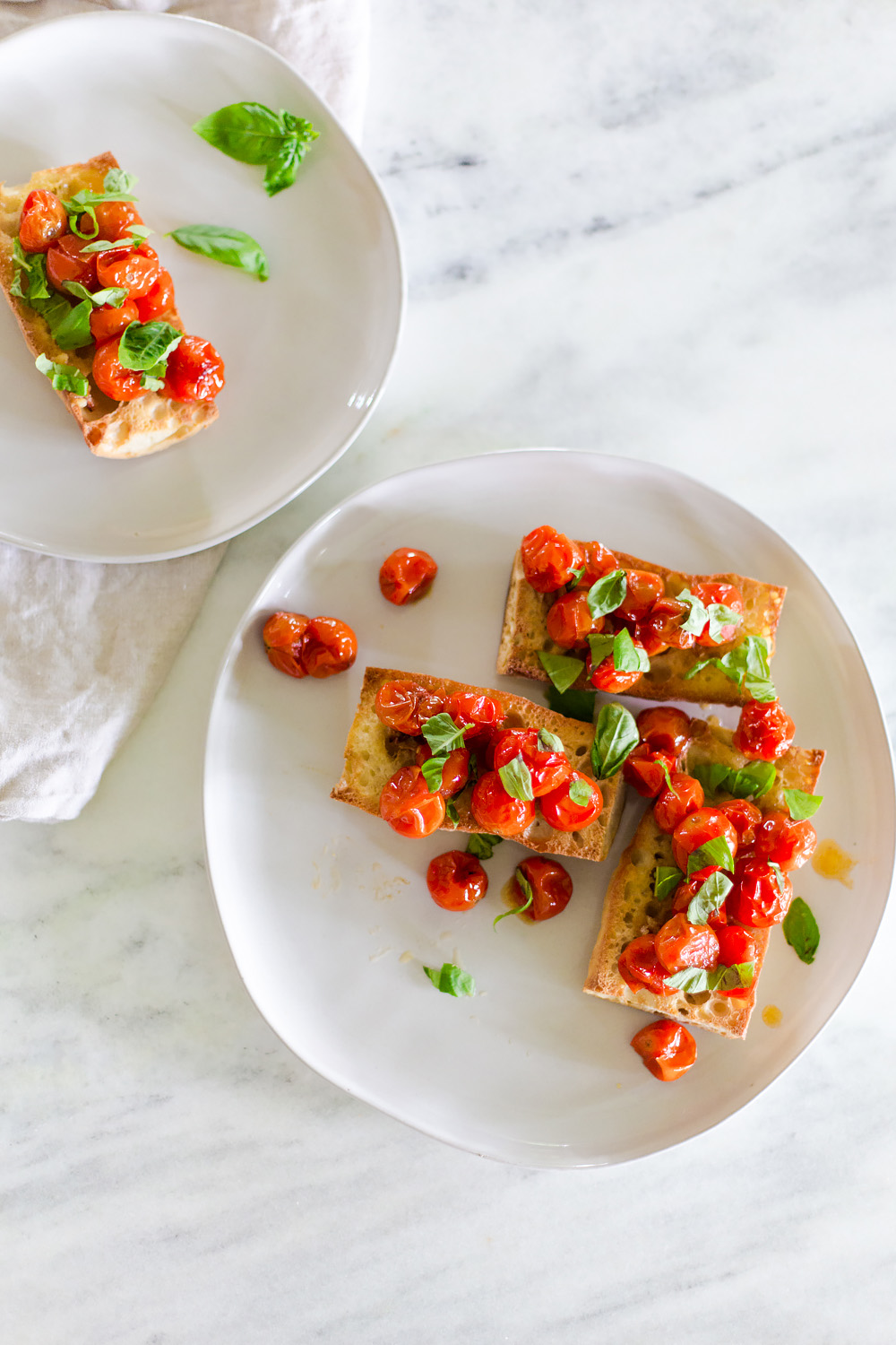 oven roasted tomatoes on toasted bread from above.