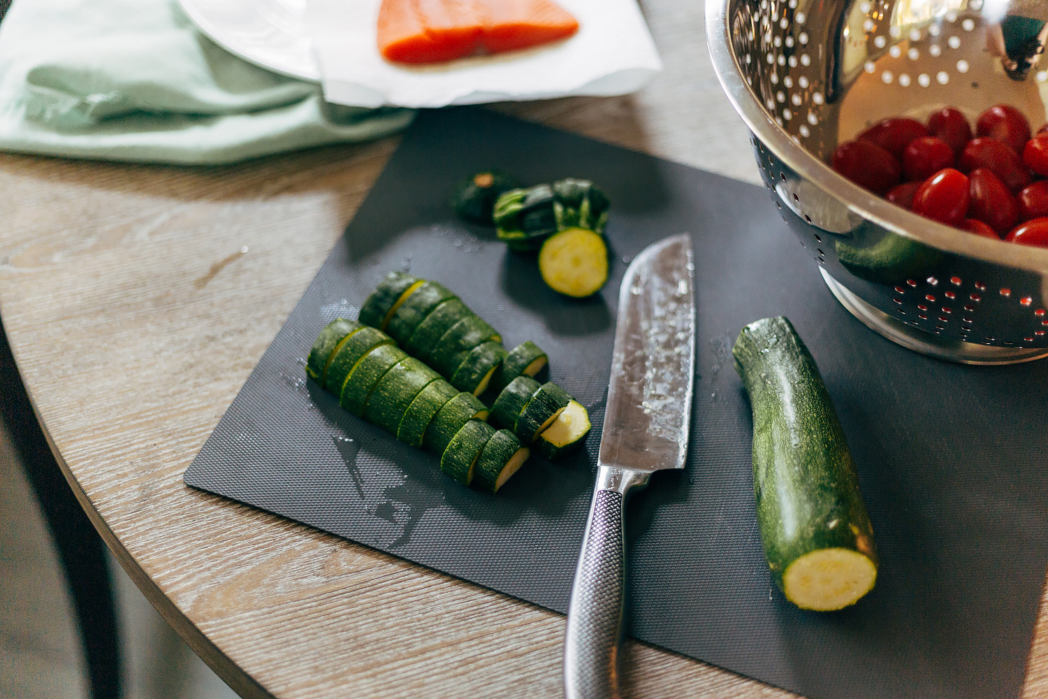 zucchini being sliced