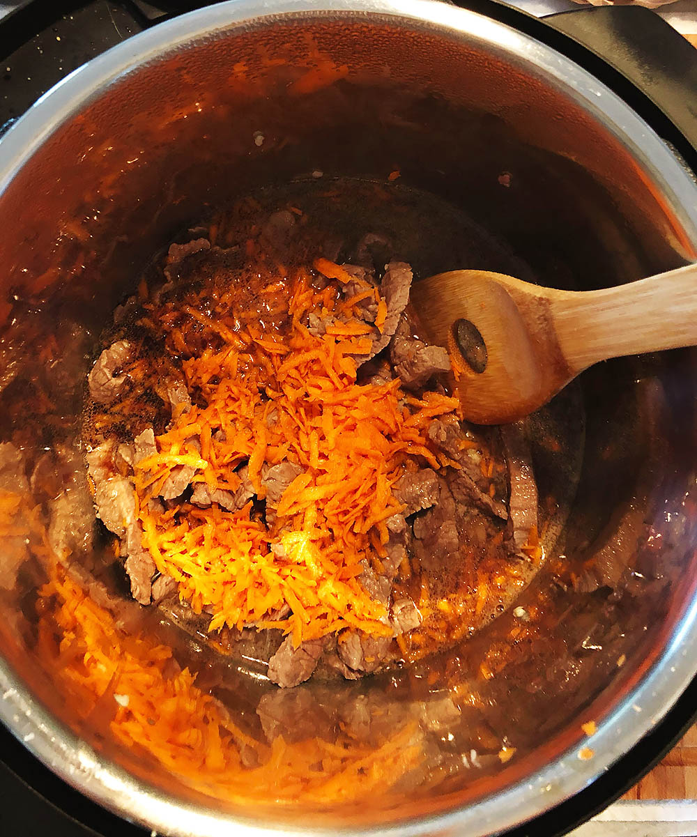 adding carrots to an instant pot