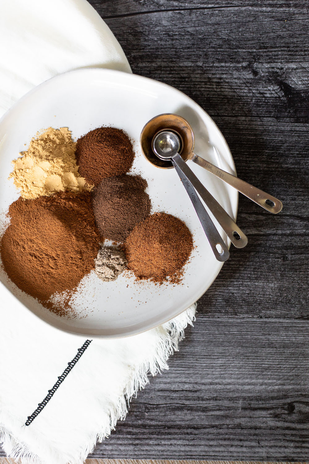 spices with measuring spoons.