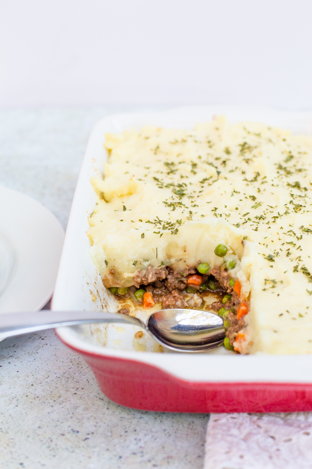 Homemade Shepherds Pie with a slice taken out