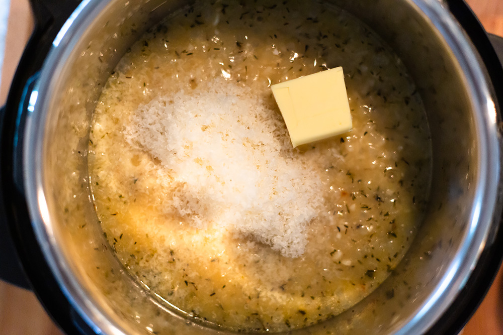 adding butter and parmesan cheese to instant pot risotto