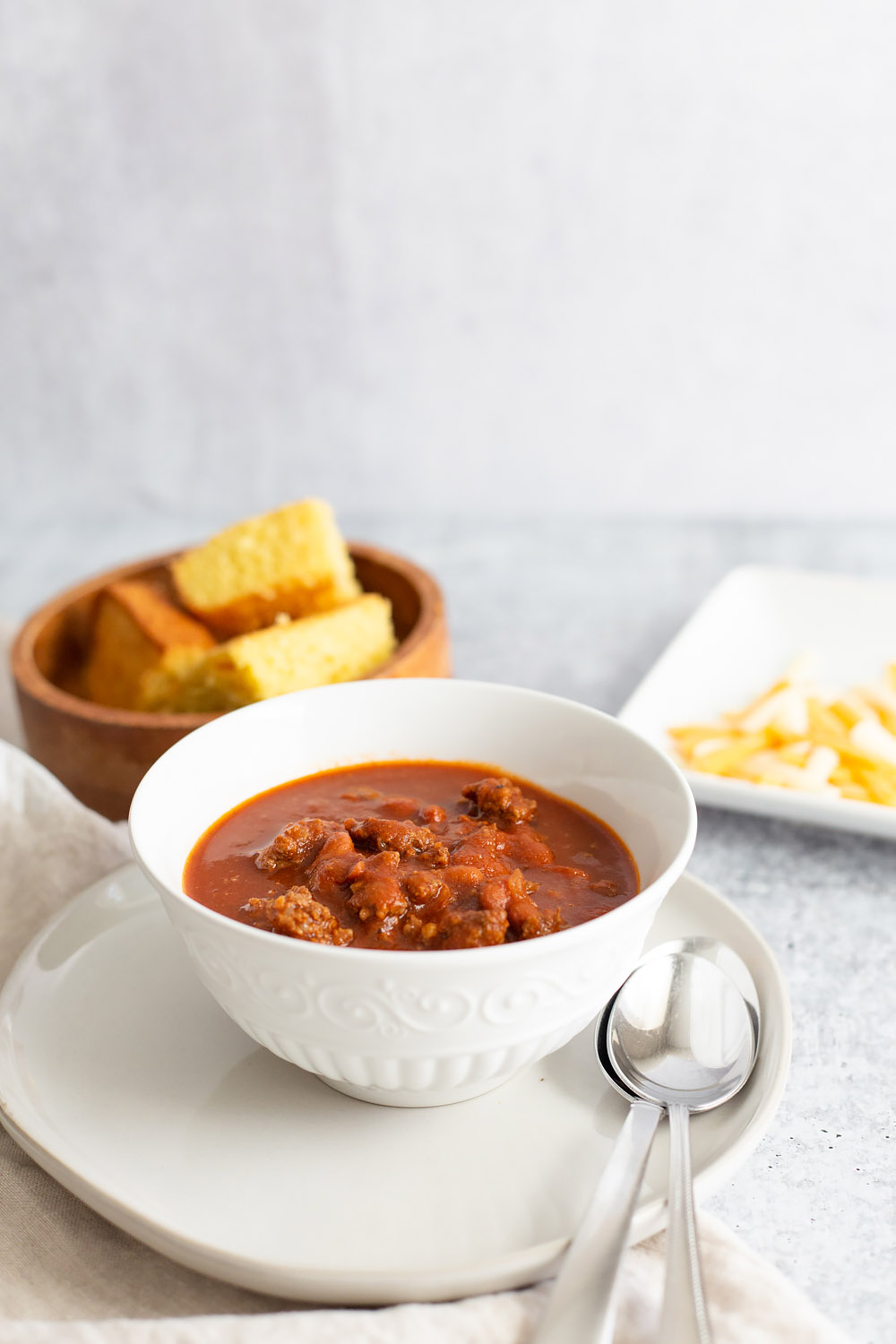 Instant Pot Chili with cornbread in the background
