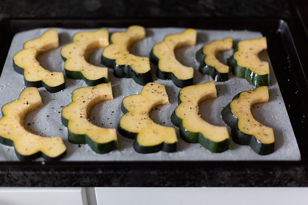 acorn squash on a sheet pan