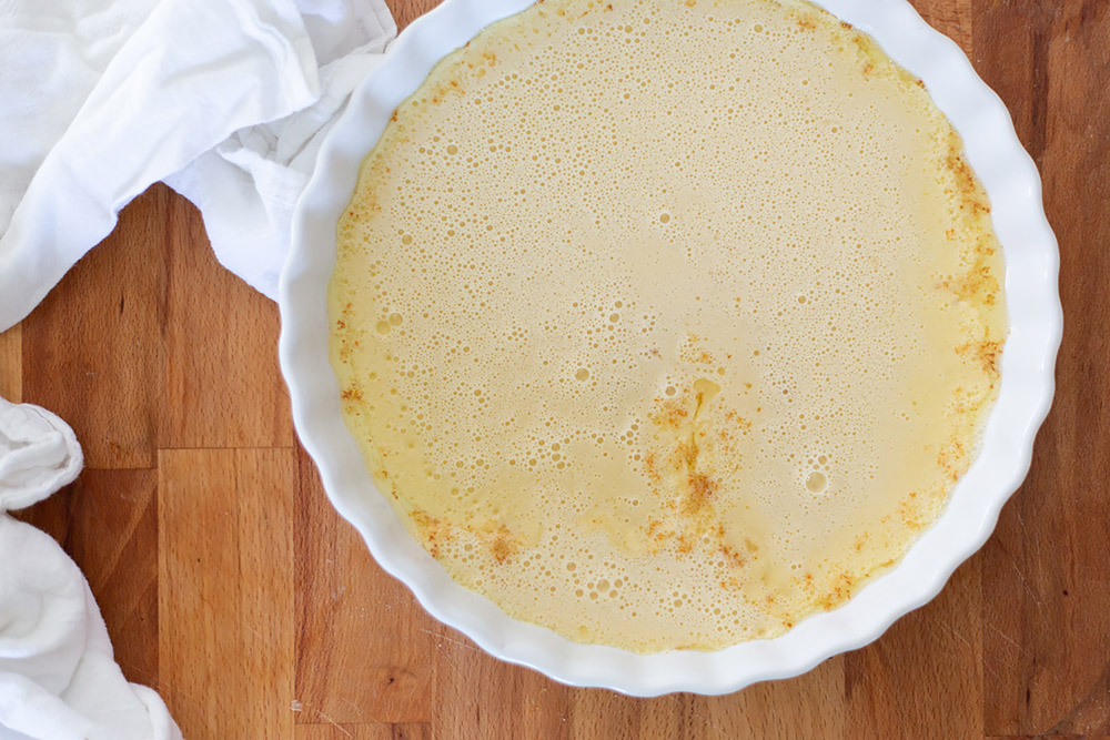 clafoutis batter in tart pan