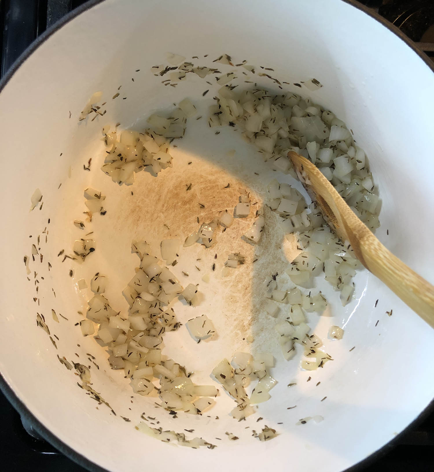 onion cooking in a pot